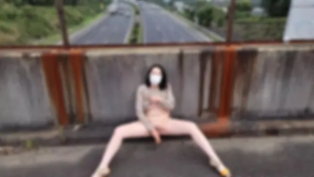 Bold masturbation on a high-speed overpass